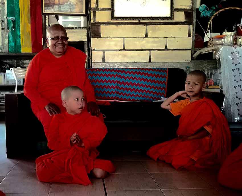 Venerable Saddha Sumana with young samaneris who temporarily ordained with her in Thailand.
